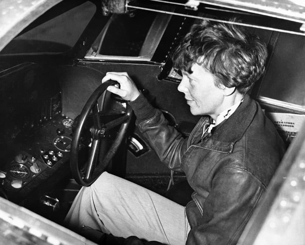 In this image Amelia Earhart at the controls of her plane nicknamed the Flying Laboratory on July 3, 1931. (AP Photo)