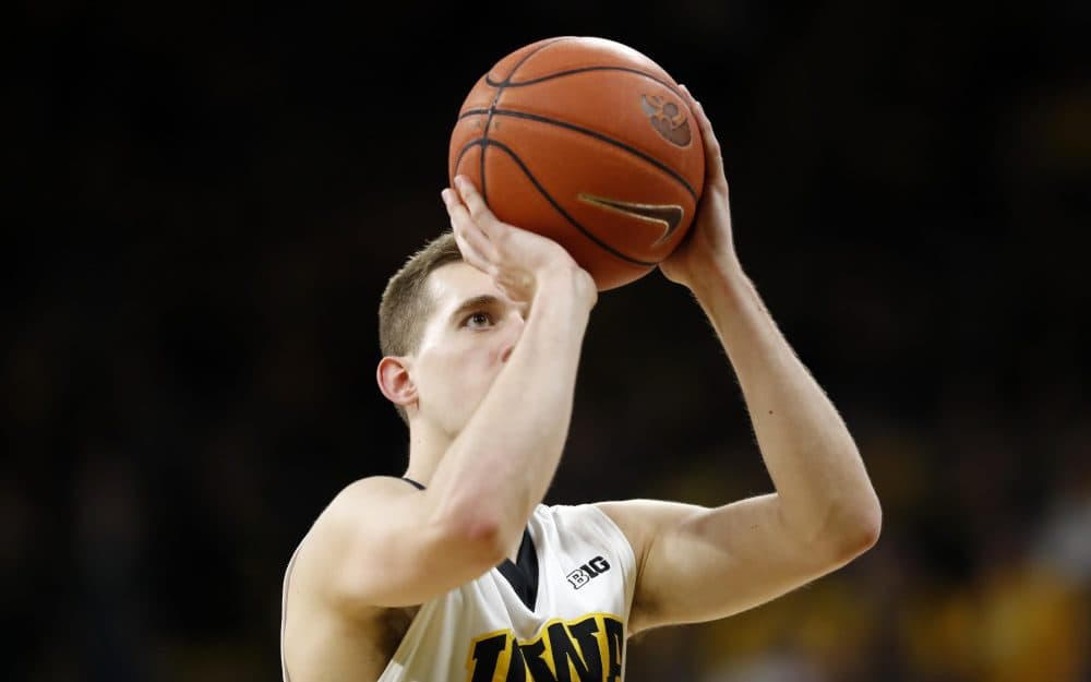 Iowa guard Jordan Bohannon had hit 34 free throws in a row when he stepped to the line with a chance to break the school record. (Charlie Neibergall/AP)