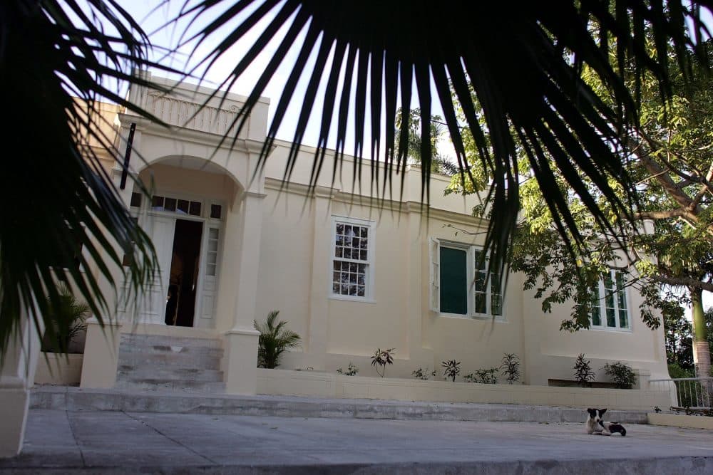 A dog lays in front of Finca Vigía, or &quot;Lookout Farm,&quot; author Ernest Hemingway's home from 1939 to 1960, in Havana, Cuba. Built in 1886 on a hillside, the home is where Hemingway wrote &quot;For Whom the Bell Tolls,&quot; &quot;The Old Man and the Sea,&quot; &quot;A Moveable Feast&quot; and &quot;Islands in the Stream.&quot; With the help of American preservationists, the home is on its way to being restored. (Joe Raedle/Getty Images)