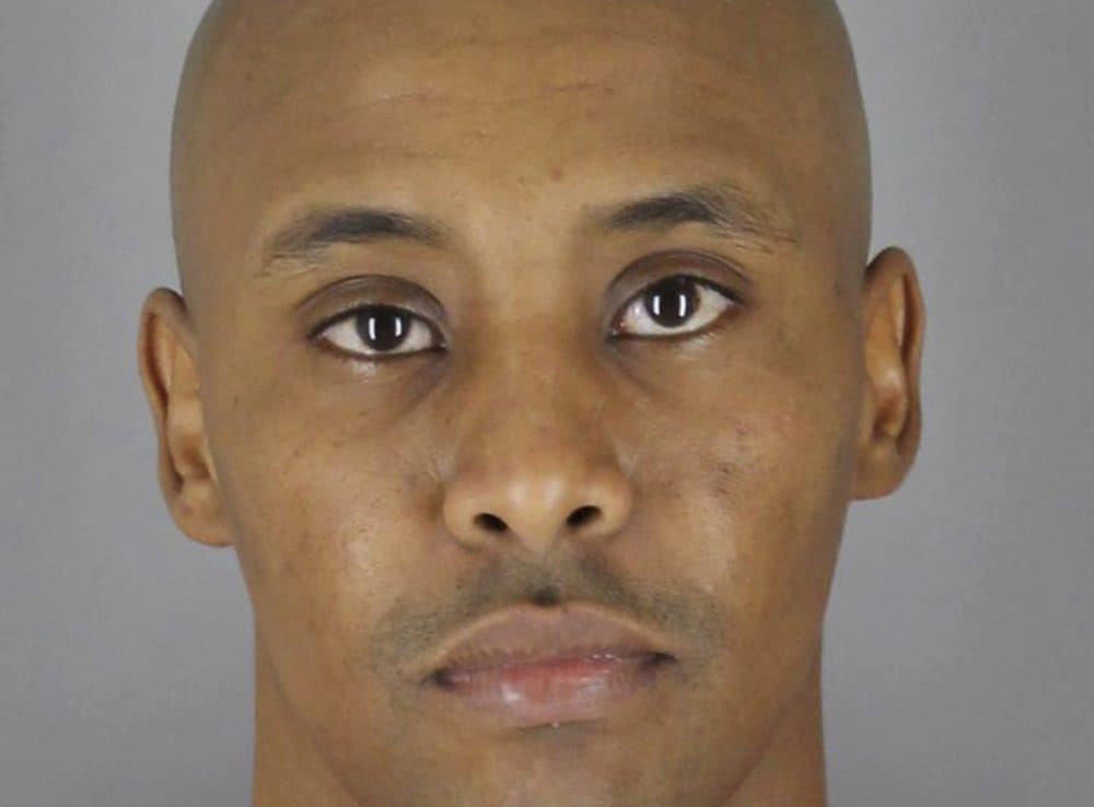This March 20, 2018 photo provided by the Hennepin County Sheriff's Office in Minneapolis, Minn., shows Minneapolis Police Officer Mohamed Noor, after he turned himself in to the Hennepin County Jail. Noor was charged Tuesday with third-degree murder and second-degree manslaughter in the shooting death of an unarmed Australian woman, Justine Ruszczyk Damond, last July, minutes after she called 911 to report a possible sexual assault behind her home in Minneapolis. (Hennepin County Sheriff's Office via AP)