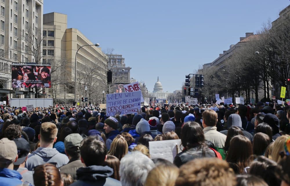 People gather on Pennsylvania Ave., during the &quot;March for Our Lives&quot; rally in support of gun control, Saturday, March 24, 2018. (AP Photo/Pablo Martinez Monsivais)