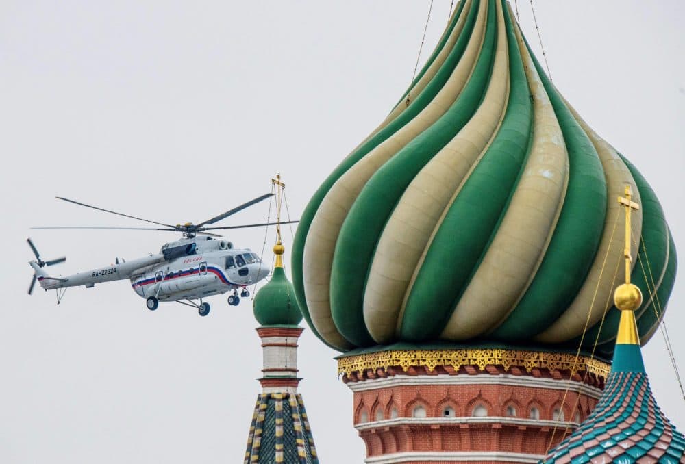One of the helicopters of Russian President Vladimir Putin flies near St. Basil's Cathedral in Moscow on March 26, 2018, while preparing to land at The Kremlin. (Mladen Antonov/AFP/Getty Images)