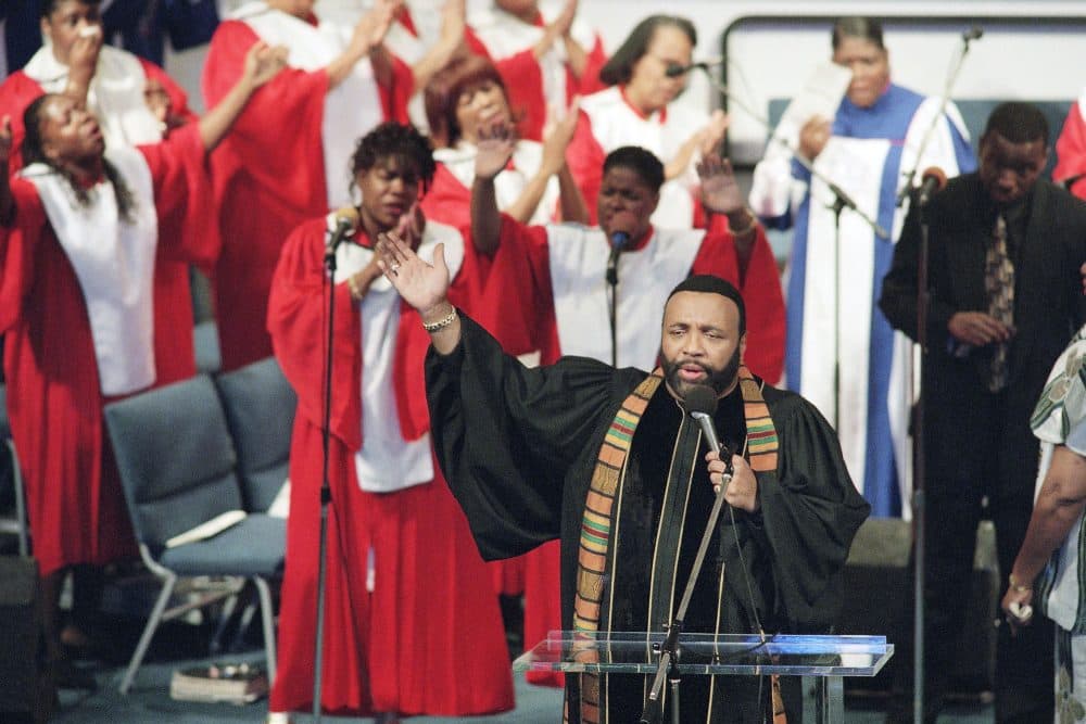 In this Sept. 1, 1996 file photo, Grammy winning gospel singer Andrae Crouch sings during service at the Christ Memorial church in Pacoima, Calif. (Frank Wiese, File/AP)