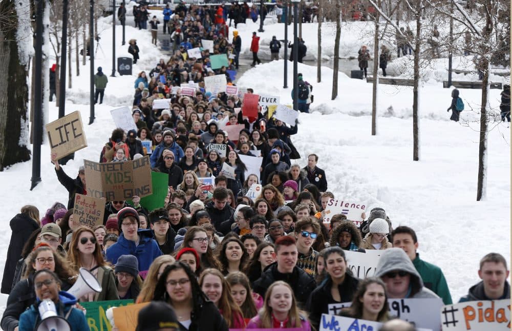 For all we are doing to try to keep students safe in school, writes Boston teacher Neema Avashia, what are we doing to keep students safe when they return to their communities? In this photo, Boston area students march to the State House in Boston on March 14, 2018. (Michael Dwyer/AP)