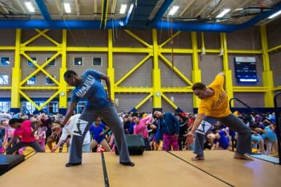 Alvin Ailey American Dance Theater master teachers Nasha Thomas and Cheryl Rowley-Gaskins lead a free community workshop at Dorchester’s Salvation Army Kroc Center in dancing selections from Ailey’s masterpiece “Revelations.” (Courtesy Robert Torres/Celebrity Series)