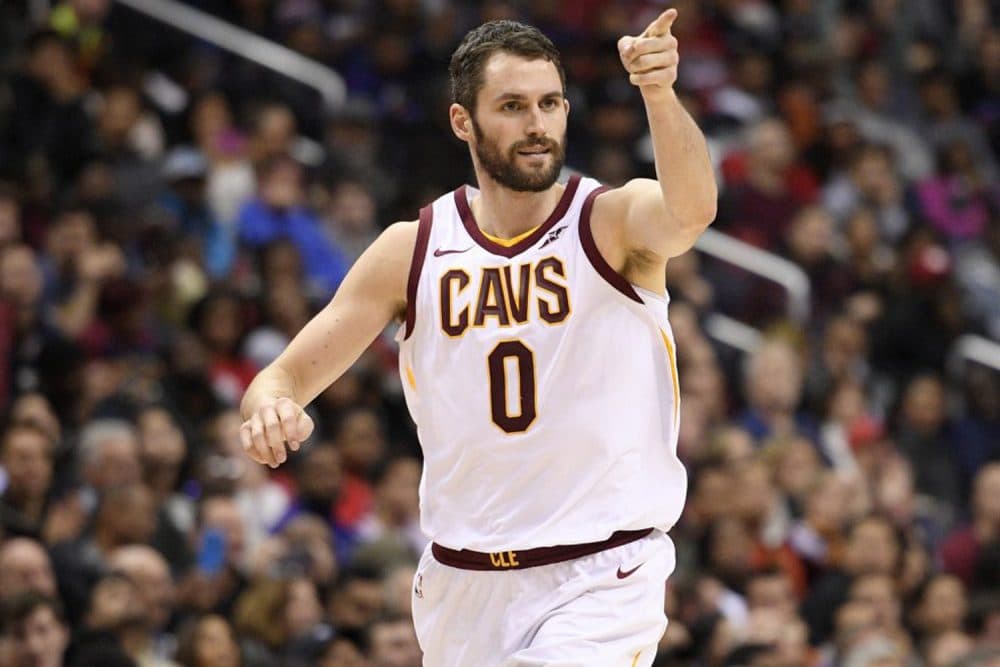 Cleveland Cavaliers forward Kevin Love (0) points after he scored during the second half of an NBA basketball game against the Washington Wizards, Sunday, Dec. 17, 2017, in Washington. The Cavaliers won 106-99. (AP Photo/Nick Wass)