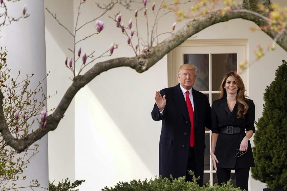 President Donald Trump waves with outgoing White House Communications Director Hope Hicks before boarding Marine One on the South Lawn of the White House in Washington, Thursday, March 29, 2018, for a short trip to Andrews Air Force Base, Md., and then on to Cleveland. (AP Photo/Andrew Harnik)
