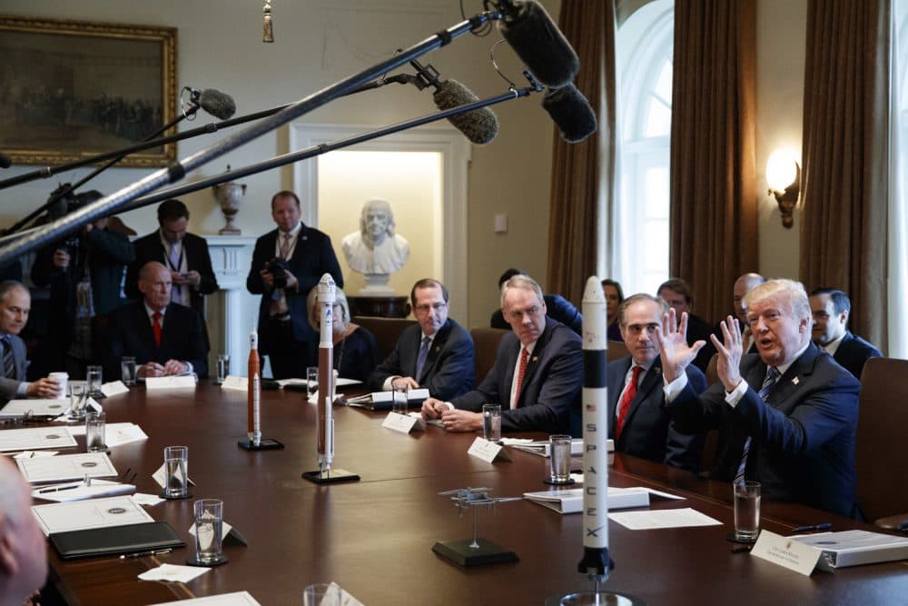 In this March 8, 2018, photo, President Donald Trump speaks during a cabinet meeting at the White House in Washington. Despite grappling with unparalleled staff departures, President Donald Trump painted a rosy picture of a smoothly functioning administration getting things done, pushing along gun restrictions and bringing jobs to the United States. (AP Photo/Evan Vucci)