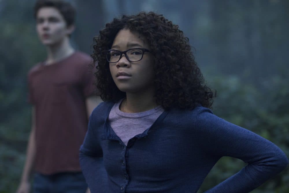 This image released by Disney shows Storm Reid, right, and Levi Miller in a scene from &quot;A Wrinkle In Time.&quot; (Atsushi Nishijima/Disney via AP)