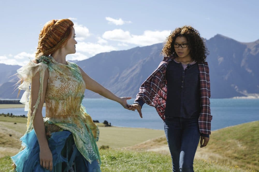 This image released by Disney shows Reese Witherspoon, left, and Storm Reid in a scene from &quot;A Wrinkle In Time.&quot; (Atsushi Nishijima/Disney via AP)
