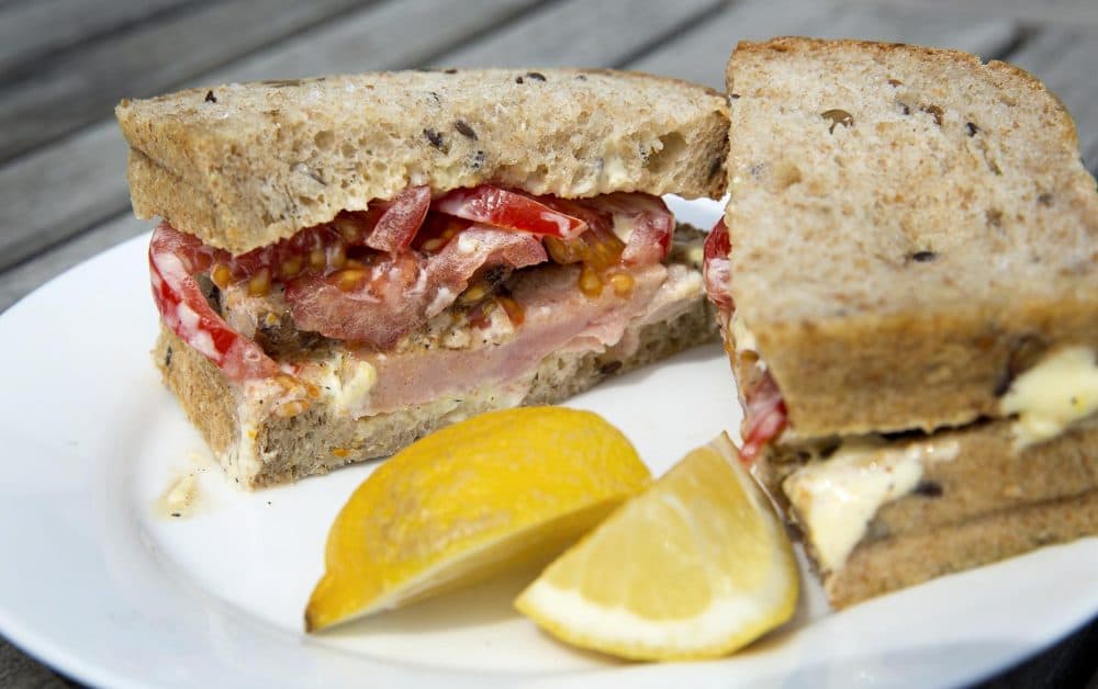 Chef Kathy Gunst's tuna sandwich with tomatoes and lemon-orange mayonnaise. (Robin Lubbock/WBUR)