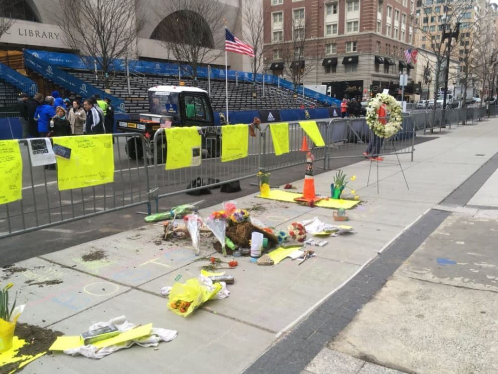 Marking the 5th anniversary of the Boston Marathon bombings on Boylston St. Sunday morning. (Alex Ashlock/WBUR)