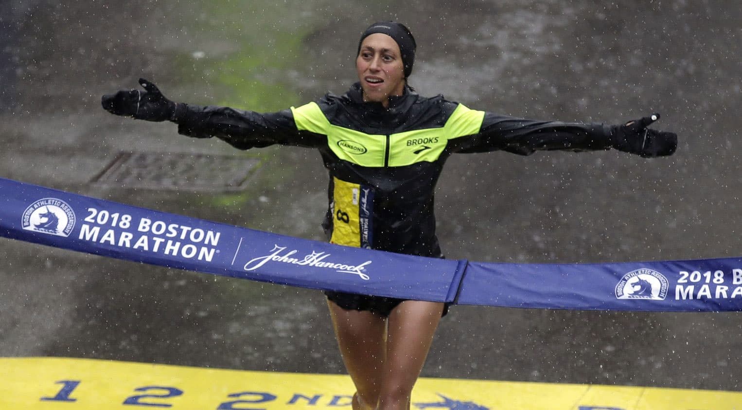 Desiree Linden, of Washington, Mich., wins the women's division of the 122nd Boston Marathon. (Charles Krupa/AP)
