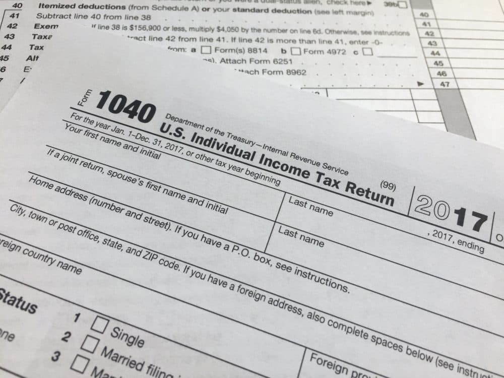 An IRS 1040 form, U.S. Individual Income Tax Return, is shown on Thursday, April 5, 2018, in New York. (AP Photo/Jenny Kane)