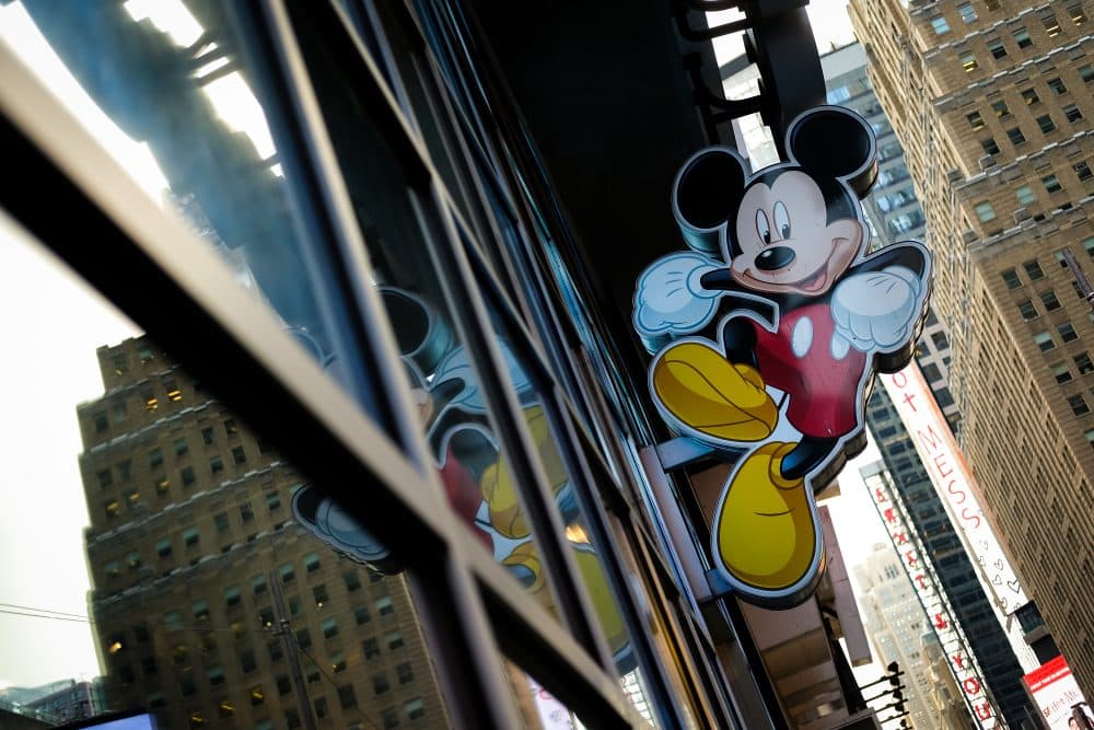 An image of Mickey Mouse, the official mascot of The Walt Disney Company, is displayed outside the Disney Store in Times Square, Dec. 14, 2017 in New York City. (Drew Angerer/Getty Images)