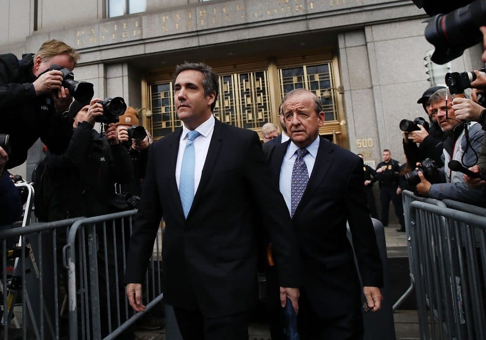 President Trump's longtime personal attorney Michael Cohen (left) exits a New York court on April 16, 2018 in New York City. Trump's lawyers asked a federal judge to temporarily block prosecutors from reviewing files seized by the FBI from Cohen's offices and hotel room earlier this month. Trump's lawyers have argued that many of the documents are protected by attorney-client privilege. (Spencer Platt/Getty Images)