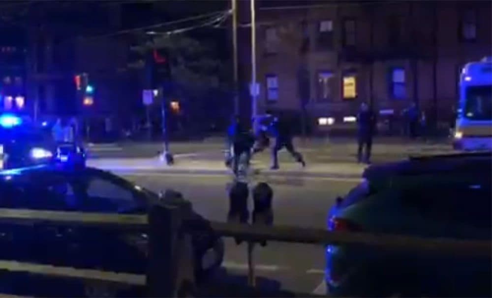 A screenshot from an onlooker's video of the arrest on Friday night (Courtesy of Cambridge Police)