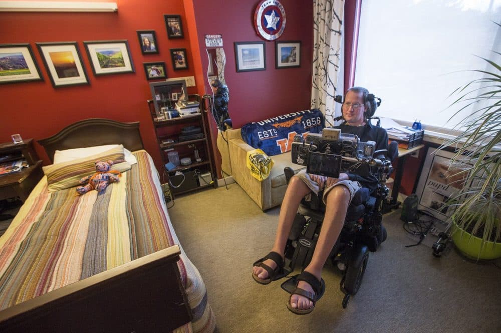 Steve Saling sits in his bedroom at the Leonard Florence Center For Living in Chelsea. (Jesse Costa/WBUR)