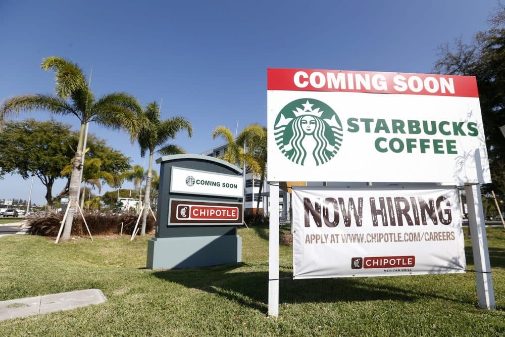 In this Wednesday, April 26, 2017 photo, a &quot;Now Hiring&quot; sign for a new Chipotle Mexican Grill restaurant is shown in Miami. (Wilfredo Lee/AP)