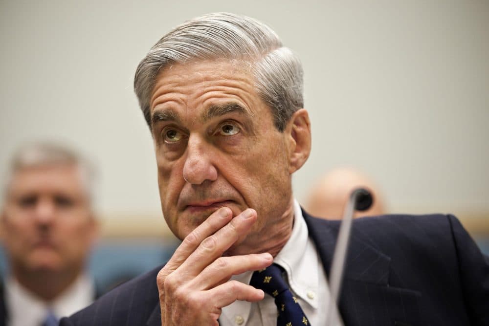 FBI Director Robert Mueller listens as he testifies on Capitol Hill in Washington in June 2013. (J. Scott Applewhite/AP)