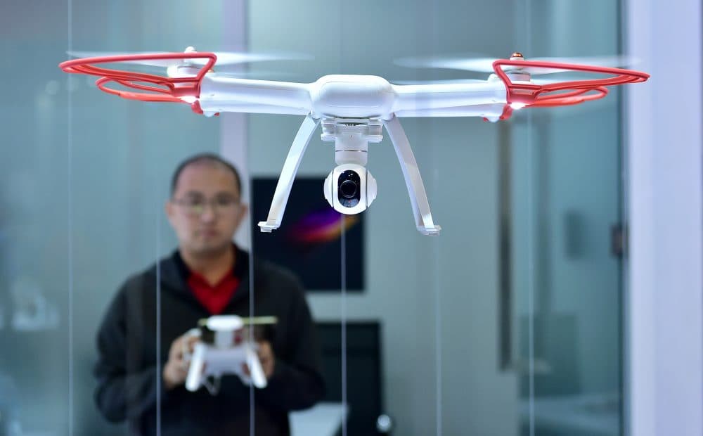A man flies the remote control Mi Drone from Xiomi, during the 2017 Consumer Electronic Show (CES) in Las Vegas in 2017. (Frederic J. Brown/AFP/Getty Images)
