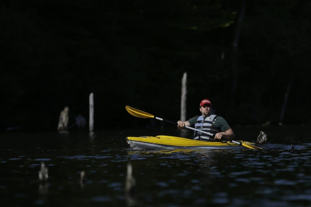 A man kayaks on Monksville Reservoir, Sunday, May 21, 2017, in Hewitt, N.J.. as the region gears up for the summer season kicking off on Memorial Day weekend. (Julio Cortez/AP)