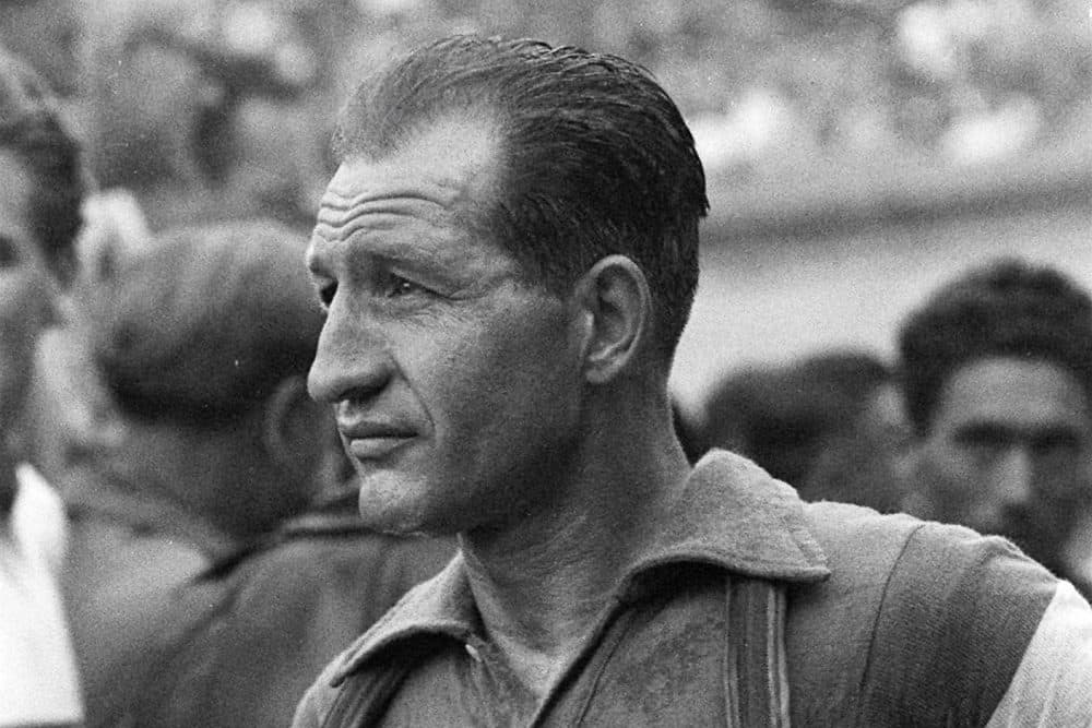 Italian cycling great Gino Bartali in 1953. During the German occupation of Italy, the champion cyclist aided the Jewish-Christian rescue network in his hometown of Florence and the surrounding area by shuffling forged documents and papers hidden in the tubes and seat of his bike. Bartali, who died in 2000, rarely spoke about it for the rest of his life, but his son Andrea Bartali led an effort to gain recognition for what his father did. (AP Photo)
