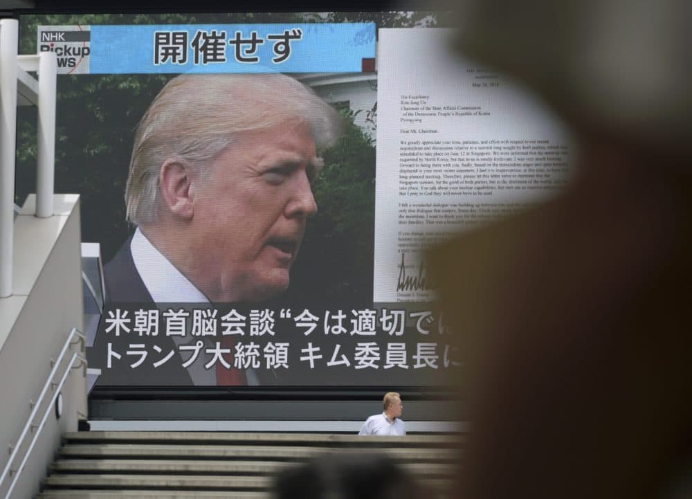 A TV screen showing President Trump, right, in Tokyo, Friday, May 25, 2018. President Donald Trump on Thursday abruptly canceled his summit with North Korea's Kim Jong Un, blaming &quot;tremendous anger and open hostility&quot; by Pyongyang — a decision North Korea called &quot;regrettable&quot; while still holding out hope for &quot;peace and stability.&quot; (Eugene Hoshiko/AP)