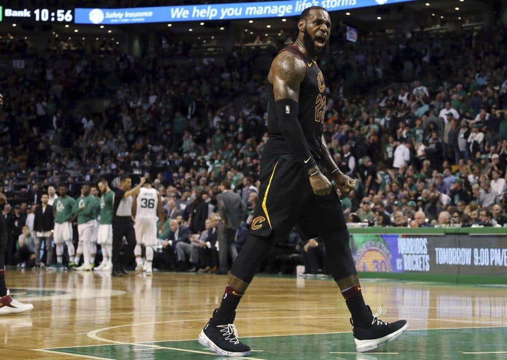Cleveland Cavaliers forward LeBron James celebrates as his team pulls away from the Boston Celtics near the end of the second half in Game 7 of the NBA basketball Eastern Conference finals, Sunday, May 27, 2018, in Boston. (Elise Amendola/AP)