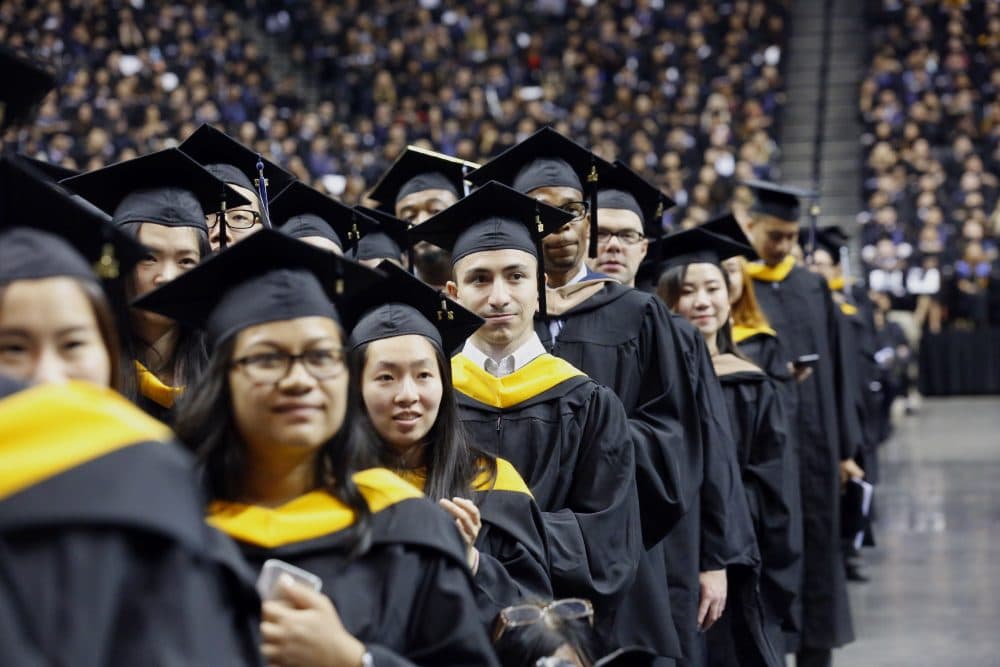 Graduates of Baruch College participate in a commencement program at Barclays Center, Monday, June 5, 2017, in the Brooklyn borough of New York. (Bebeto Matthews/AP)