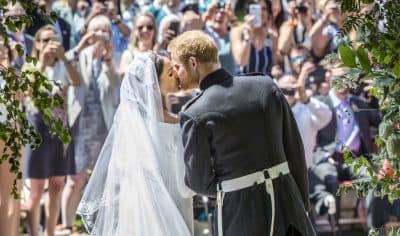 Meghan Markle and Prince Harry kiss on the steps of St George's Chapel at Windsor Castle following their wedding in Windsor Castle in Windsor, near London, England, Saturday, May 19, 2018. (Danny Lawson/AP)