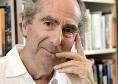 In this Sept. 8, 2008, file photo, author Philip Roth poses for a photo in the offices of his publisher, Houghton Mifflin, in New York. Roth, prize-winning novelist and fearless narrator of sex, religion and mortality, has died at age 85, his literary agent said Tuesday, May 22, 2018. (Richard Drew/AP)