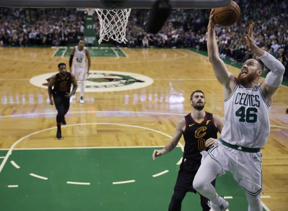 Boston Celtics center Aron Baynes (46) goes to the hoop past Cleveland Cavaliers center Kevin Love (0) during Game 5 of the NBA basketball Eastern Conference Finals, Wednesday, May 23, 2018, in Boston. (Charles Krupa/AP)