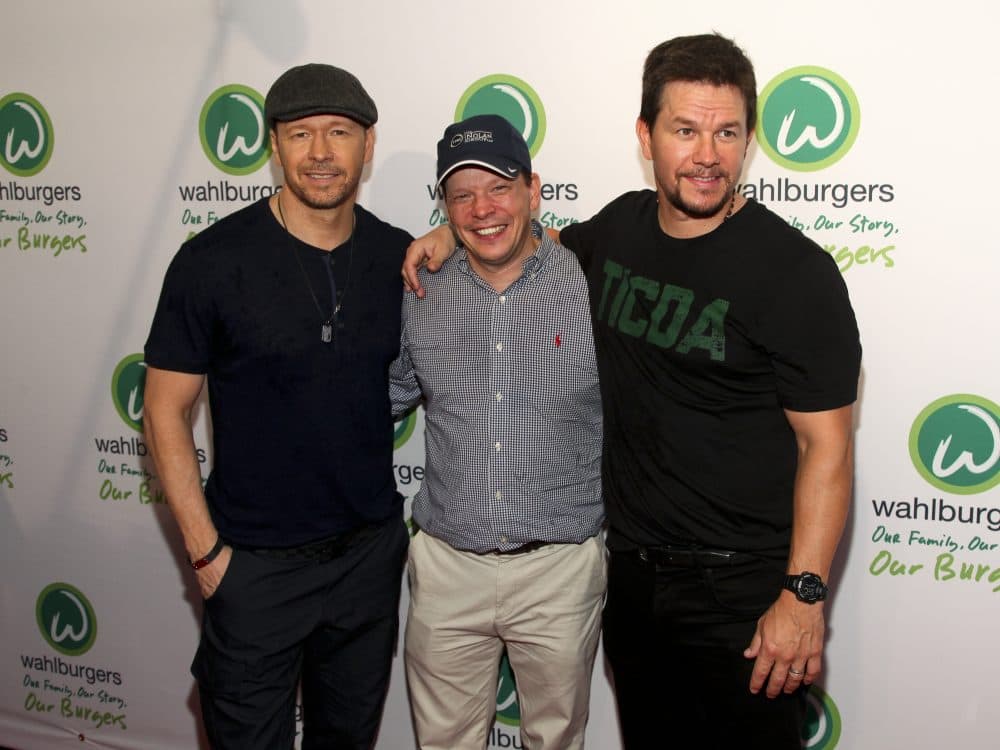From left: Donnie, Paul and Mark Wahlberg attend the Wahlburgers Coney Island preview party on June 23, 2015, in New York. (Andy Kropa/Invision/AP)