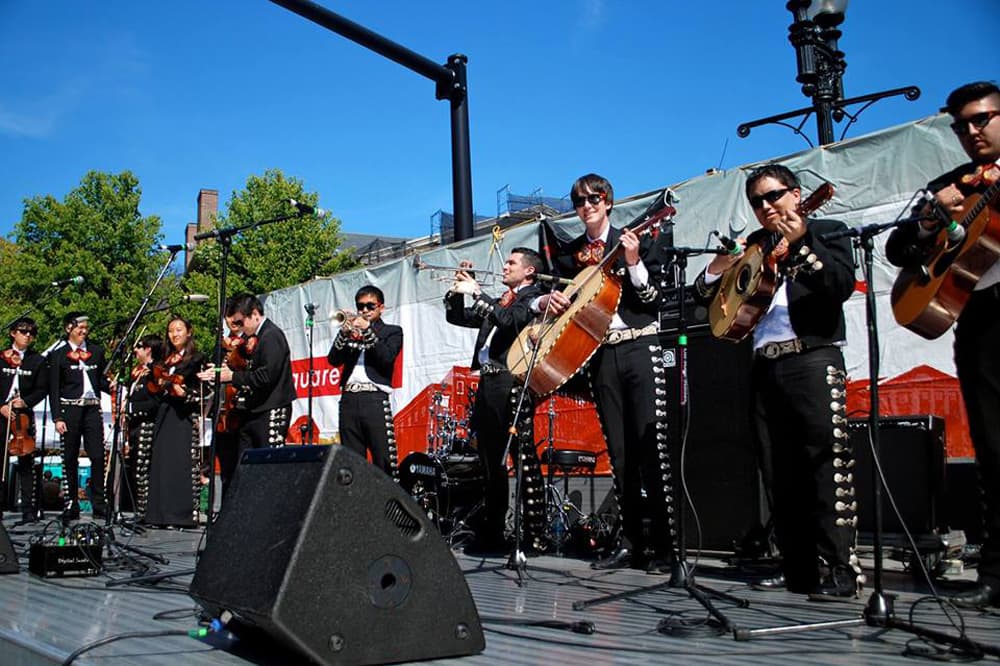 A mariachi group performs in Harvard Square at a previous Mayfair. (Courtesy Harvard Square)