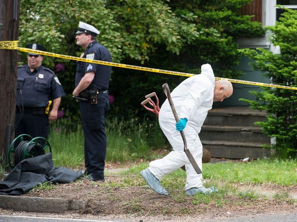 Investigators brought shovels onto the property in Springfield, Massachusetts, where three bodies were recently found. (Greg Saulmon/MassLive.com and The Republican)