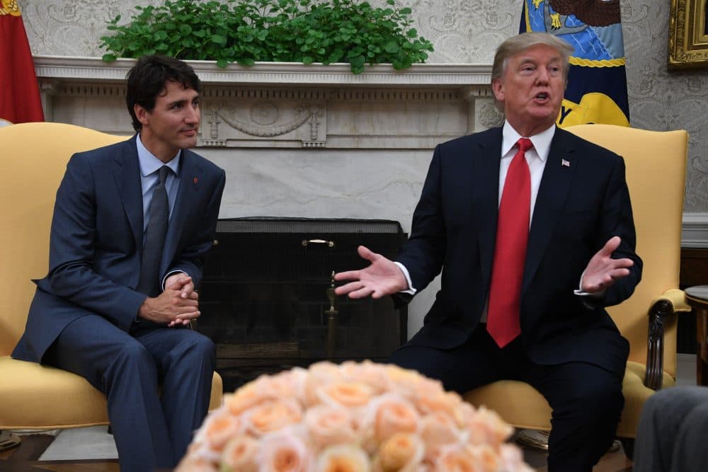 President Trump (right) speaks during a meeting with Canadian Prime Minister Justin Trudeau at the White House in Washington, D.C., on Oct. 11, 2017. (Jim Watson/AFP/Getty Images)