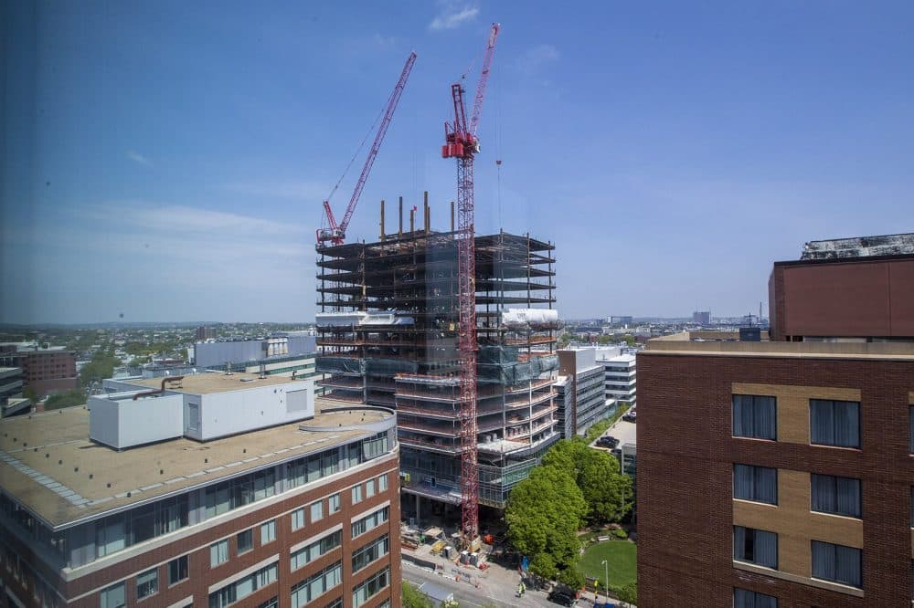 Contruction is rampant all over Kendall Square. The 19-story, 453,768-square-foot office tower at 145 Broadway will be the new home of Akamai Technologies. (Jesse Costa/WBUR)