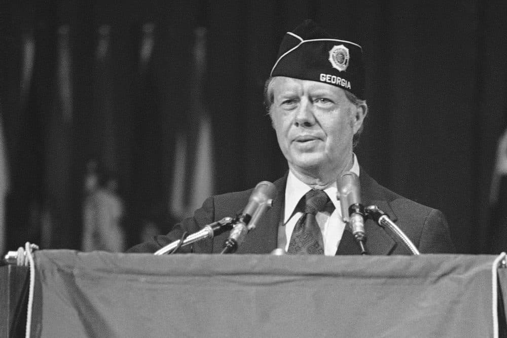 Presidential candidate Jimmy Carter speaks to members of the American Legion at their national convention in Seattle on Aug. 24, 1976. Carter called for a blanket pardon for Vietnam draft resisters, and later pardoned them as president in 1977. (AP Photo)