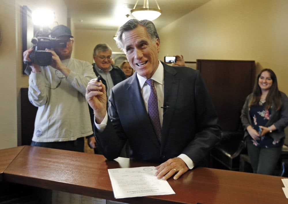 Mitt Romney smiles as he declares his candidacy for the U.S. Senate at the state elections office, at the Utah State Capitol, in Salt Lake City on March 15. (Rick Bowmer/AP)