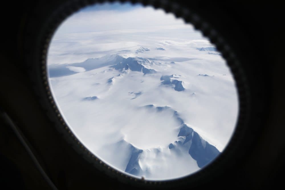Mountains and land ice are seen from NASA's Operation IceBridge research aircraft in the Antarctic Peninsula region, on Nov. 4, 2017, above Antarctica. (Mario Tama/Getty Images)