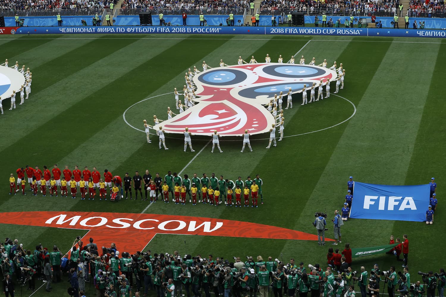 The teams of Russia and Saudi Arabia line up prior to their group A march which opens the 2018 soccer World Cup at the Luzhniki stadium in Moscow, Russia, Thursday, June 14, 2018. (Victor Caivano/AP)