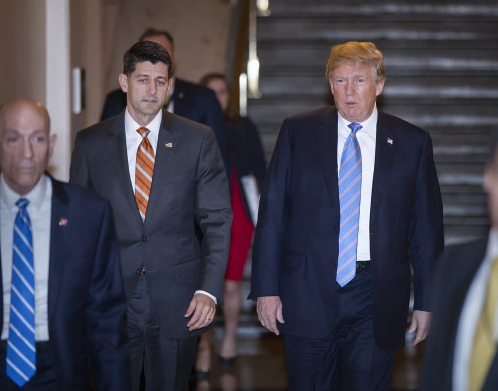 Speaker of the House Paul Ryan, R-Wis., left, walks with President Donald Trump as they head to a meeting of House Republicans to discuss a GOP immigration bill at the Capitol in Washington, Tuesday, June 19, 2018. (J. Scott Applewhite/AP)