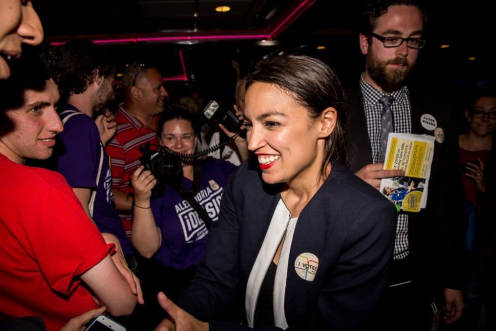 Progressive challenger Alexandria Ocasio-Cortez celebrates with supporters at a victory party in the Bronx after upsetting incumbent Democratic Rep. Joseph Crowly on June 26, 2018 in New York. Ocasio-Cortez upset Rep. Joseph Crowley in New York’s 14th Congressional District, which includes parts of the Bronx and Queens. (Scott Heins/Getty Images)