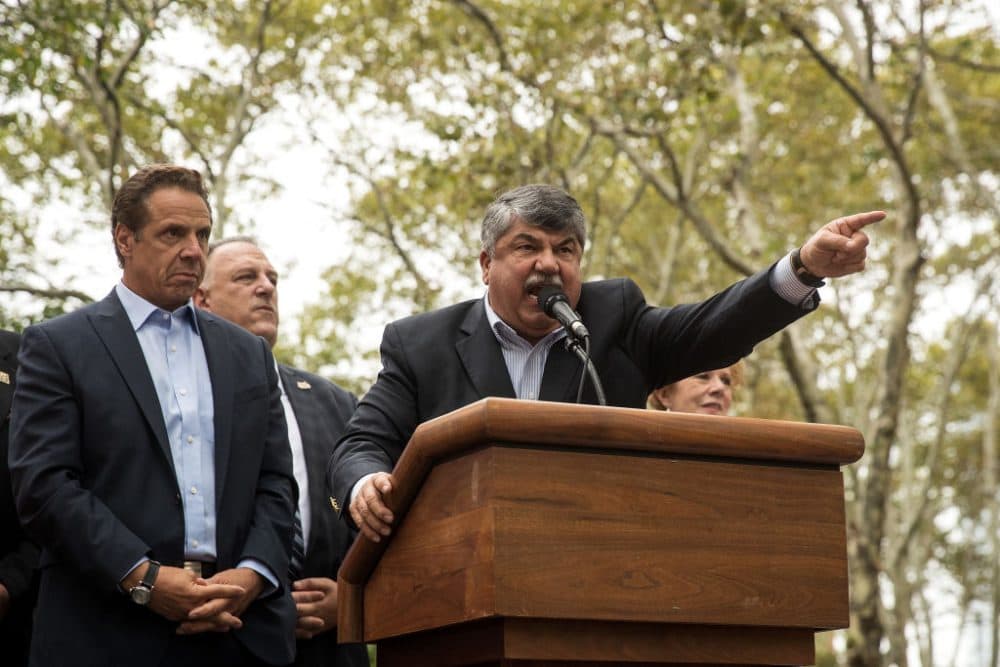 (Left to right) New York Gov. Andrew Cuomo looks on as Richard Trumka, president of the AFL-CIO, speaks during a rally of hundreds of union members in support of IBEW Local 3 (International Brotherhood of Electrical Workers) at Cadman Plaza Park, Sept. 18, 2017 in the Brooklyn borough of New York. (Drew Angerer/Getty Images)