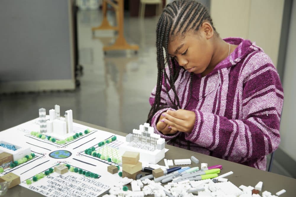 A camper works on a project at a Hip Hop Architecture Camp. Michael Ford, an architect and designer, started the free camps to teach disadvantaged kids about design and urban planning. (Courtesy M.O.D. Media Productions)