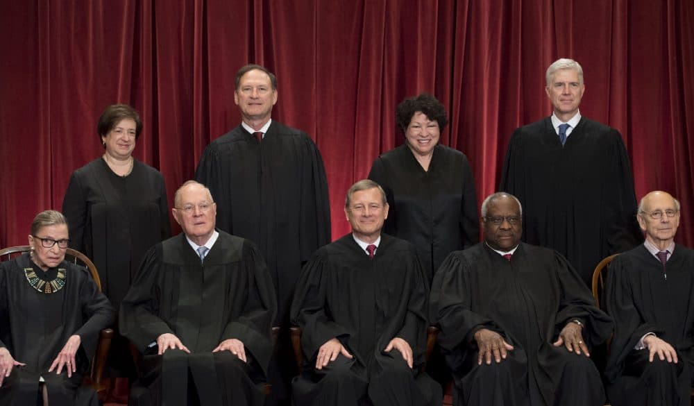 Justices of the U.S. Supreme Court sit for their official group photo at the Supreme Court in Washington, D.C., on June 1, 2017. Seated (L-R): Associate Justices Ruth Bader Ginsburg and Anthony M. Kennedy, Chief Justice of the US John G. Roberts, Associate Justices Clarence Thomas and Stephen Breyer. Standing (L-R): Associate Justices Elena Kagan, Samuel Alito Jr., Sonia Sotomayor and Neil Gorsuch. (Saul Loeb/AFP/Getty Images)