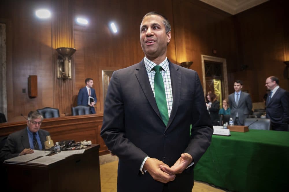 Ajit Pai, chairman Federal Communications Commission, prepares to testify about his budget before a Senate Appropriations subcommittee on Capitol Hill in Washington, Thursday, May 17, 2018. (J. Scott Applewhite/AP)