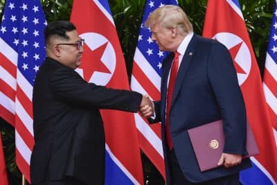North Korea leader Kim Jong Un and U.S. President Donald Trump shake hands at the conclusion of their meetings at the Capella resort on Sentosa Island Tuesday, June 12, 2018 in Singapore. (Susan Walsh/AP)