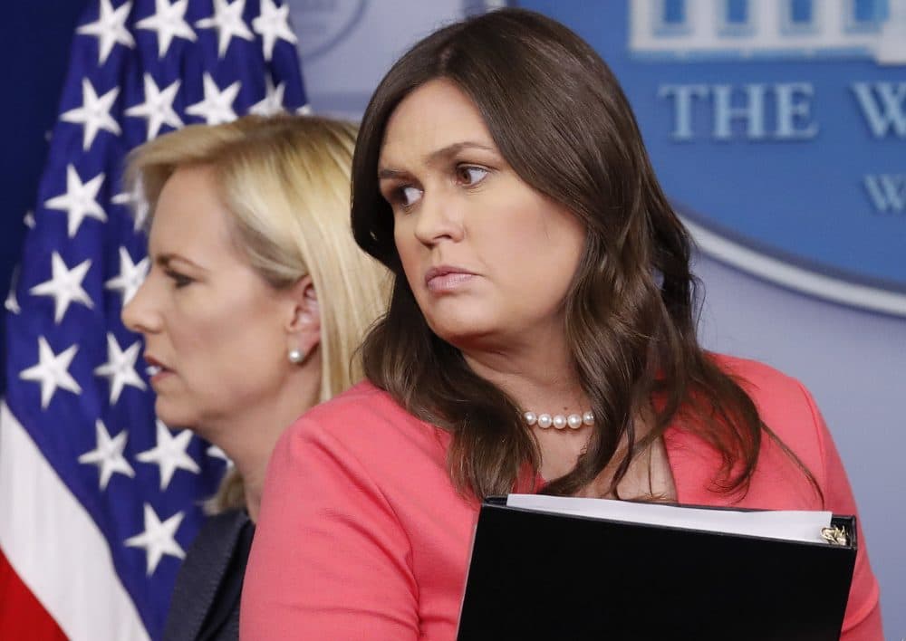 Homeland Security Secretary Kirstjen Nielsen, left, walks past White House press secretary Sarah Huckabee Sanders, right, after speaking to the media during the daily briefing in the Brady Press Briefing Room of the White House, Monday, June 18, 2018. (Pablo Martinez Monsivais/AP)